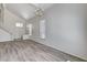Spacious living room with wood floors, high ceilings, and natural light at 7521 Reindeer Ct, Las Vegas, NV 89147