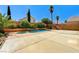 Backyard featuring a large in-ground pool, spa, and concrete patio at 7521 Reindeer Ct, Las Vegas, NV 89147