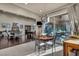 Eat-in kitchen dining area with sliding door access to a covered patio at 7670 Frittata Ave, Las Vegas, NV 89113