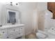 Clean bathroom with updated vanity and fixtures, and shower/tub combination at 7720 W Agate Ave, Las Vegas, NV 89113