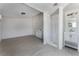 Bathroom and shower in simple color scheme with updated shower at 7720 W Agate Ave, Las Vegas, NV 89113