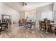 Expansive living room with ample natural light and tile flooring at 7720 W Agate Ave, Las Vegas, NV 89113