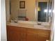 Bathroom with double sinks, vanity, and ample storage, providing a functional and stylish space at 7955 Canto Ave, Las Vegas, NV 89147