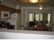 Efficient kitchen featuring appliances, adjacent dining area and sliding door access to outdoor patio at 7955 Canto Ave, Las Vegas, NV 89147