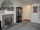Cozy living room displaying a fireplace with decorative mantel and hearth, creating a warm and inviting atmosphere at 7955 Canto Ave, Las Vegas, NV 89147