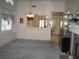 Inviting living room area with neutral carpet and plenty of natural light at 7955 Canto Ave, Las Vegas, NV 89147