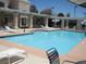 Large community pool with plenty of lounge chairs and seating, perfect for relaxation at 7955 Canto Ave, Las Vegas, NV 89147