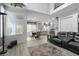 Bright open living room with modern finishes, lots of natural light and a decorative toy truck at 8083 Shadowvale Dr, Las Vegas, NV 89147