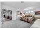 Large main bedroom featuring walk-in closet, carpeted floors, and neutral paint at 8083 Shadowvale Dr, Las Vegas, NV 89147