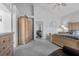 Bright main bedroom with vaulted ceilings, walk-in closet and neutral carpet at 8083 Shadowvale Dr, Las Vegas, NV 89147