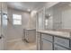 Bathroom featuring double sinks with granite countertops and modern fixtures at 8254 Palladium St, Las Vegas, NV 89113