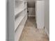 Walk-in closet features ample shelving and storage space, well-organized for convenience at 8254 Palladium St, Las Vegas, NV 89113