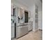 Kitchen with stainless steel refrigerator and gray cabinets and counter space at 8254 Palladium St, Las Vegas, NV 89113