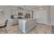 Modern kitchen featuring sleek gray cabinets, granite countertops, and stainless steel appliances at 8254 Palladium St, Las Vegas, NV 89113