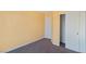 Bedroom features neutral carpet and walls with sliding closet doors at 8448 Quarentina Ave, Las Vegas, NV 89149