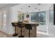Entertainers bar area with backyard access and pool views at 8825 Rozetta Ct, Las Vegas, NV 89134
