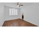Bright, spacious bedroom features modern ceiling fan and an en-suite bathroom at 8825 Rozetta Ct, Las Vegas, NV 89134