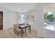 Bright breakfast nook with backyard access and views of the pool and patio at 8825 Rozetta Ct, Las Vegas, NV 89134