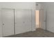 Carpeted bedroom with closet and neutral paint, plenty of space and storage at 901 Heritage Bend Dr, Las Vegas, NV 89138