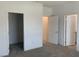 Bright bedroom features plush carpet, neutral paint, and closet at 901 Heritage Bend Dr, Las Vegas, NV 89138