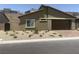 Inviting single-story home with low-maintenance landscaping and an attached garage at 901 Heritage Bend Dr, Las Vegas, NV 89138