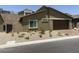 Cozy home featuring desert landscaping, an attached garage, and an inviting entrance at 901 Heritage Bend Dr, Las Vegas, NV 89138