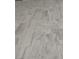 Close-up of the new tile floors in a neutral color at 901 Heritage Bend Dr, Las Vegas, NV 89138