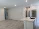 Bright kitchen features a modern island with white countertop and stainless sink at 901 Heritage Bend Dr, Las Vegas, NV 89138