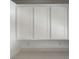 Close-up of the newly installed white kitchen cabinets and quartz countertops at 901 Heritage Bend Dr, Las Vegas, NV 89138