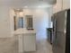 Well-designed kitchen with a central island, stainless steel appliances, and modern finishes at 901 Heritage Bend Dr, Las Vegas, NV 89138