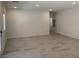 Spacious living room with tile flooring and a neutral color palette at 901 Heritage Bend Dr, Las Vegas, NV 89138