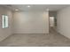 Spacious living room features tiled floors, recessed lighting, and neutral paint at 901 Heritage Bend Dr, Las Vegas, NV 89138