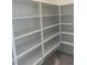 Walk-in pantry features multiple shelves for ample storage space at 901 Heritage Bend Dr, Las Vegas, NV 89138