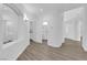 Hallway view with vinyl flooring and all-white walls at 9500 Catalina Cove Cir, Las Vegas, NV 89147