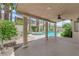 Covered patio overlooking a pool and spa area, perfect for outdoor relaxation and entertaining at 9500 Catalina Cove Cir, Las Vegas, NV 89147