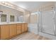 Spacious bathroom featuring double sinks, bathtub and a standing shower at 9709 Fast Elk St, Las Vegas, NV 89143