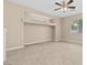 Spacious bedroom features neutral walls, window, and a ceiling fan with lighting at 9709 Fast Elk St, Las Vegas, NV 89143