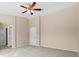 Neutral bedroom featuring high ceilings, access doors and ceiling fan at 9709 Fast Elk St, Las Vegas, NV 89143