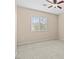 Bright bedroom with a ceiling fan and a window providing natural light at 9709 Fast Elk St, Las Vegas, NV 89143