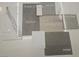 A collection of finish samples with hard flooring, tile, paint and carpet at 10266 Rosemont Hills St, Las Vegas, NV 89141