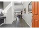 Welcoming foyer with tile flooring, staircase, high ceilings, and modern decor at 10776 Maltese Falcon Ave, Las Vegas, NV 89129