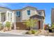 Charming two-story home featuring a well-kept front yard and a two car attached garage at 10776 Maltese Falcon Ave, Las Vegas, NV 89129