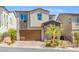 Charming two-story home featuring a well-kept front yard and a two car attached garage at 10776 Maltese Falcon Ave, Las Vegas, NV 89129