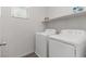 Convenient laundry room equipped with modern washer and dryer units at 10776 Maltese Falcon Ave, Las Vegas, NV 89129