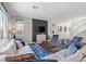 Living room showcasing stylish decor with a contemporary design and comfortable seating area at 10776 Maltese Falcon Ave, Las Vegas, NV 89129