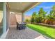 Relaxing covered patio area, perfect for dining and entertaining outdoors at 10776 Maltese Falcon Ave, Las Vegas, NV 89129