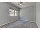 Cozy bedroom featuring carpet and dual windows at 11377 Gravitation Dr, Las Vegas, NV 89135