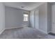 Bedroom featuring a closet with sliding doors and carpet at 11377 Gravitation Dr, Las Vegas, NV 89135