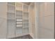 Walk-in closet with custom shelving at 11377 Gravitation Dr, Las Vegas, NV 89135