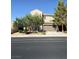 Charming two-story home with a well-manicured lawn and attached two-car garage in a residential neighborhood at 1146 Olivia Pkwy, Henderson, NV 89011